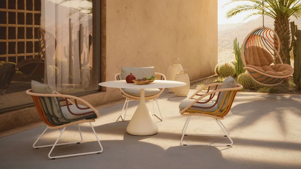 Dedon Kida hanging lounge chair, an outdoor lounge chair wrapped in striped Dedon Fiber Touch
