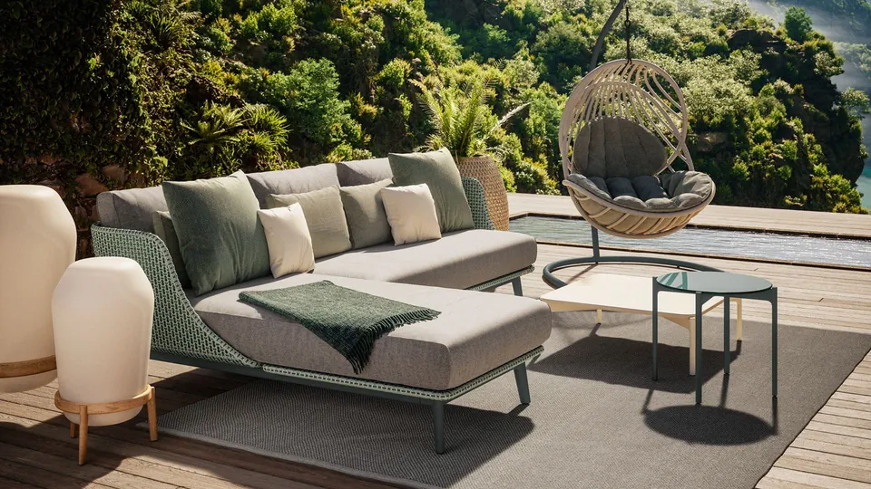 Dedon outdoor sectional, modular sofa woven in Dedon Fiber on a terrace